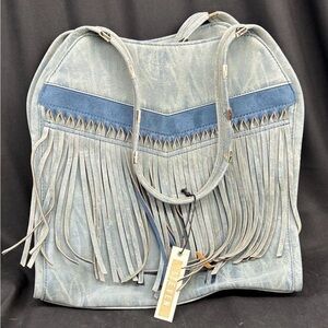 Steven by Steve Madden "Jgreta" fringe shoulder bag.